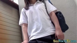 Asian teenager rides toy